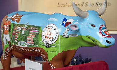Fiberglass cow painted for University of Texas charity event by Kermit Eisenhut.